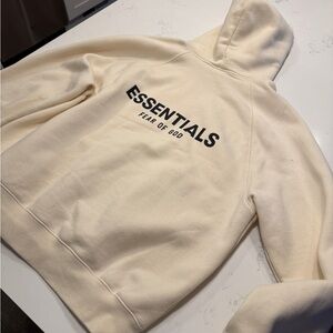 Fear of God Essentials cream pullover hoodie